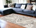 7' X 9' Gray And Tan Abstract Area Rug