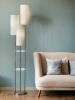 68" Silver Three Light Novelty Floor Lamp With White Linen Cylinder Shade