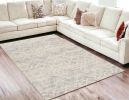5' X 8' Ivory Distressed Ikat Pattern Area Rug