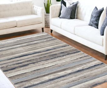 5' X 8' Blue And Beige Distressed Stripes Area Rug