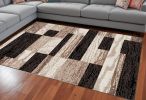 8' X 10' Black Brown And Beige Patchwork Area Rug
